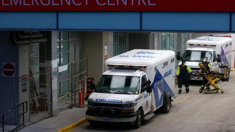 ambulances parked outside emergency department at a hospital