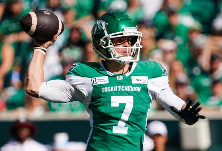 Trevor Harris throwing football.