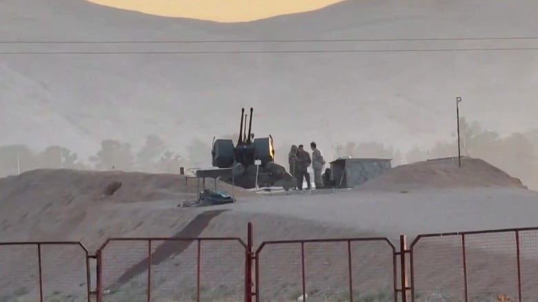 Military personnel stand guard at a nuclear facility in the Zardanjan area of Isfahan, Iran, April 19, 2024, in this screengrab taken from video