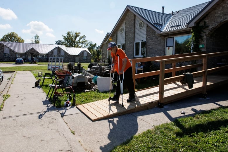 Ray Fisher leaves his house during a voluntary evacuation of the Aamjiwnaang First Nation, near Sarnia, Ont., on Oct. 1, 2024. The nearby Ineos Styrolution plant is removing benzene from a storage tank as part of the plants dissolution.