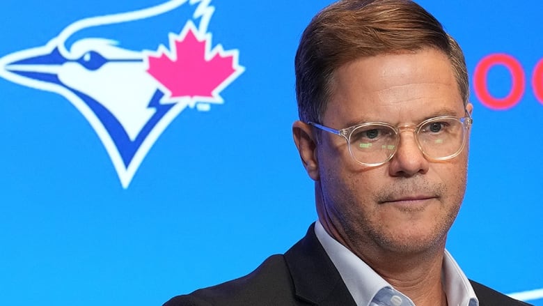 Toronto Blue Jays general manager Ross Atkins addresses reporters at a season-ending news conference on Oct. 2, 2024.