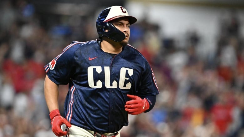 Josh Naylor #22 of the Cleveland Guardians rounds the bases on a solo home run during the seventh inning against the Minnesota Twins at Progressive Field on September 18, 2024 in Cleveland, Ohio.