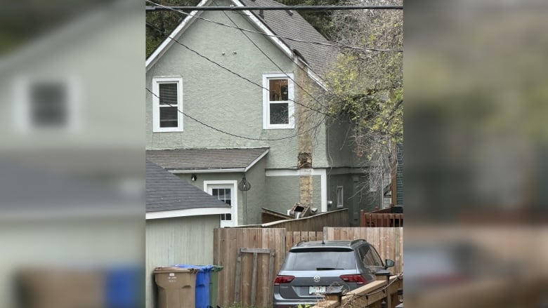 A picture of a house in Regina with a chimney completely destroyed.