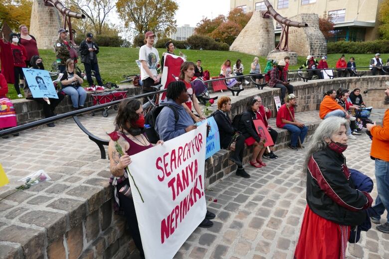 People holding signs