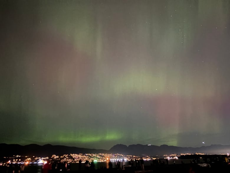 Hues of green and pink above the North Vancouver skyline.