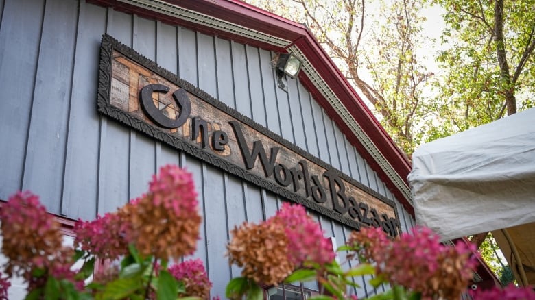 A barn and some hydrangeas with a 