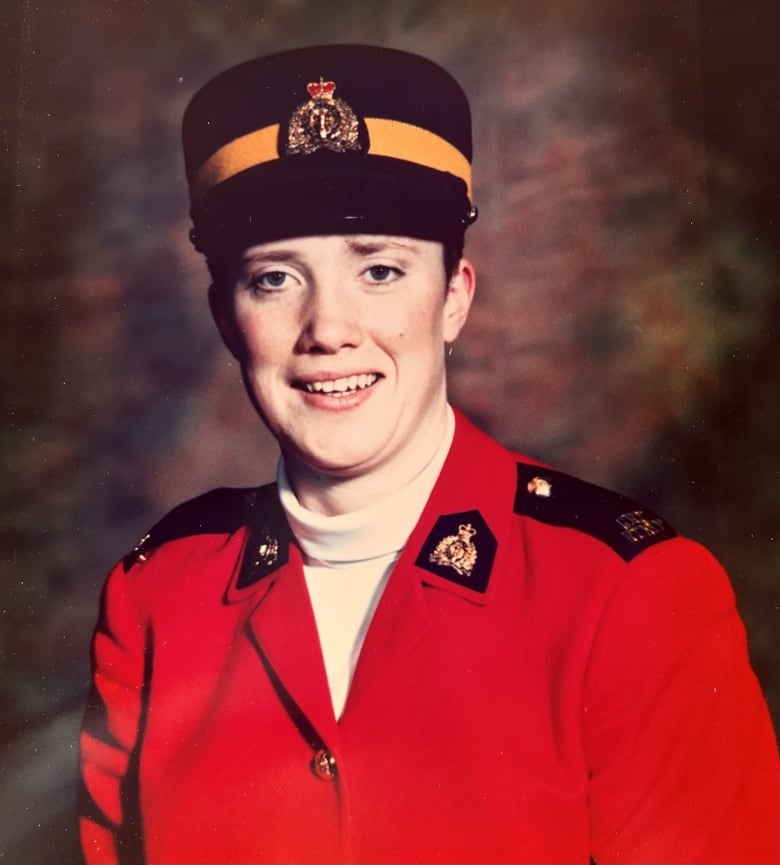 A photo of a female RCMP officer in red serge.