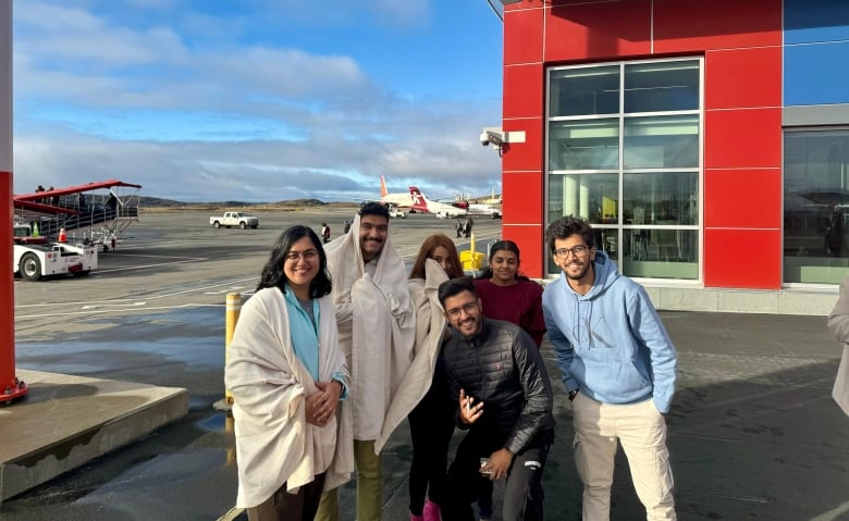 Deepika Chhillar and fellow passengers pose for photo.