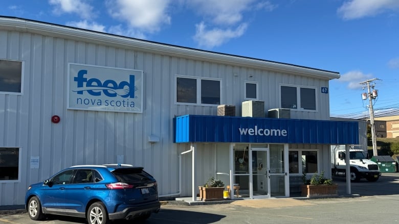 A building with a Feed Nova Scotia sign is shown