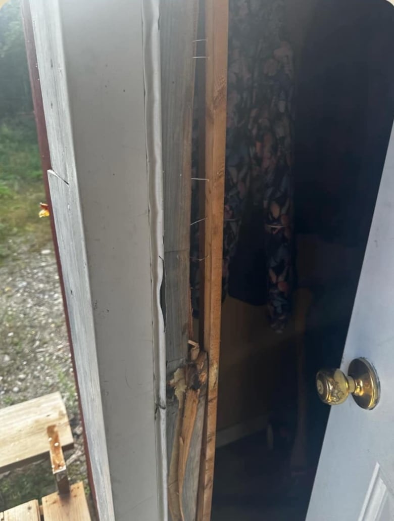 A cabin door with a broken lock. 