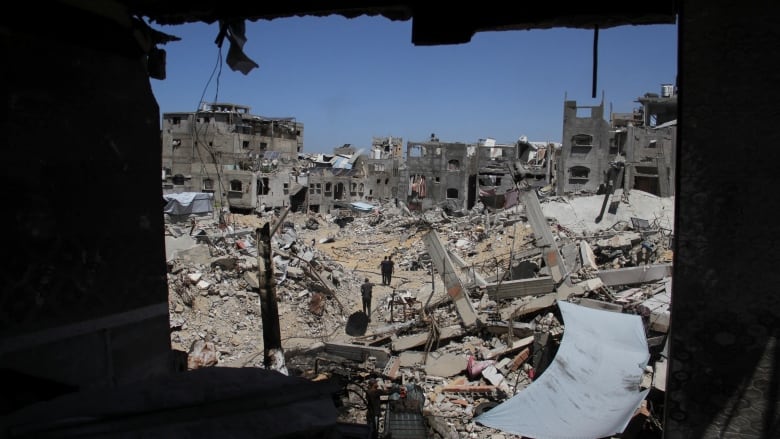 A view of destroyed buildings and rubble.