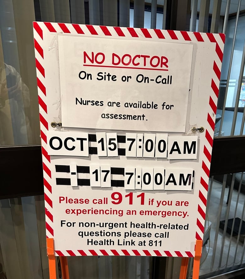 A sign warning patients no doctor is on site at the Fairview Emergency Department.