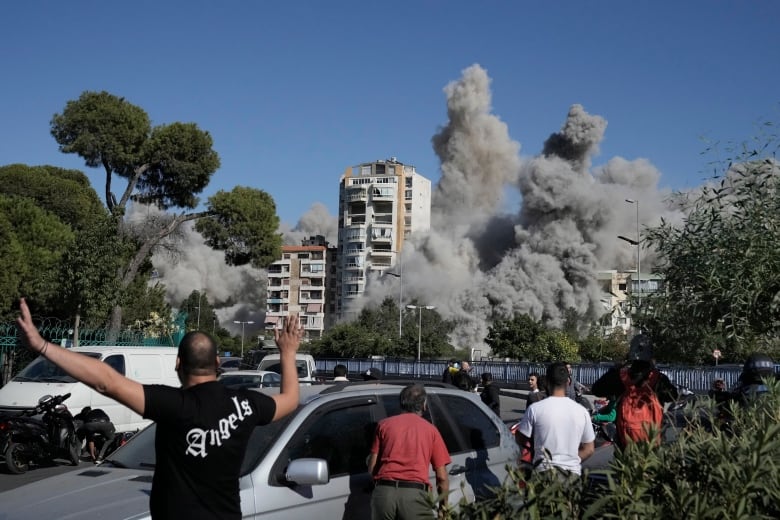 Smoke rises from an  apartment complex