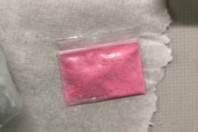 A baggie of pink cocaine.