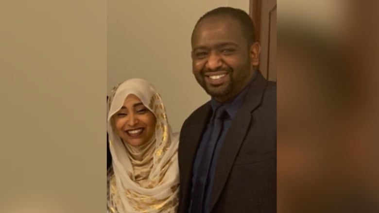 Dina Hamid stands with her brother Musaab in a photo taken before the war started. Last October, Musaab was kidnapped and detained for five months by the paramilitary Rapid Support Forces (RSF).