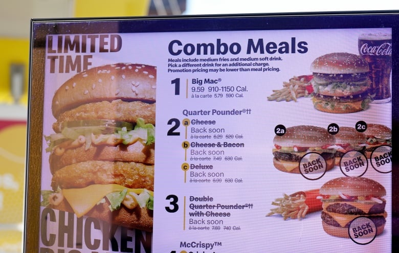 A menu at a McDonald's drive-thru in Omaha, Nebraska, indicates that Quarter Pounder burgers are temporarily not available to customers.