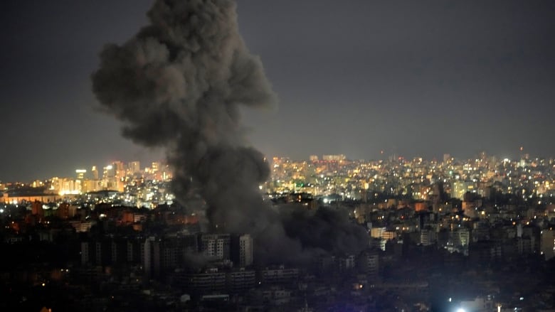 Smoke rises in the Beirut suburb of Dahiyeh, in the aftermath of an Israeli airstrike.