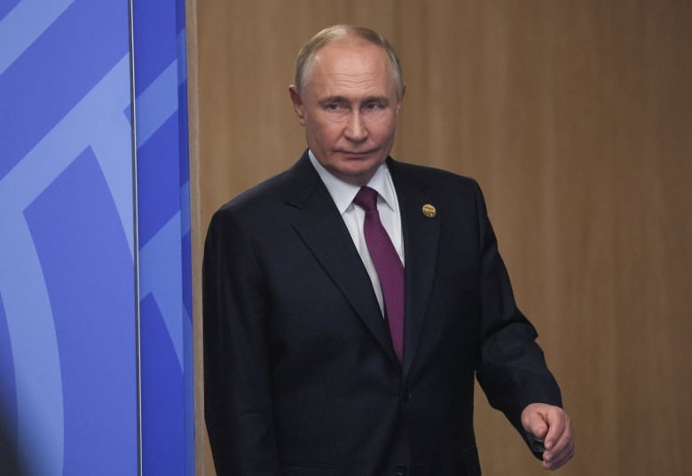 Russian President Vladimir Putin enters a hall for meeting with Mauritania's President Mohamed Ould Ghazouani on the sidelines of the BRICS summit in Kazan, Russia, 24 October 2024. 