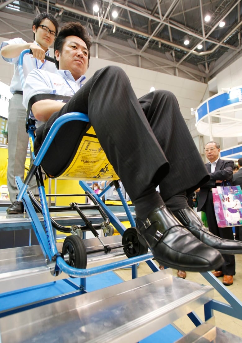 Demonstration of an evacuation chair.