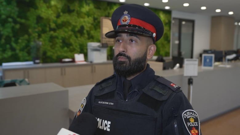 Photo of a police officer speaking