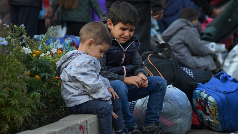 Children sitting in Stepanakert. 