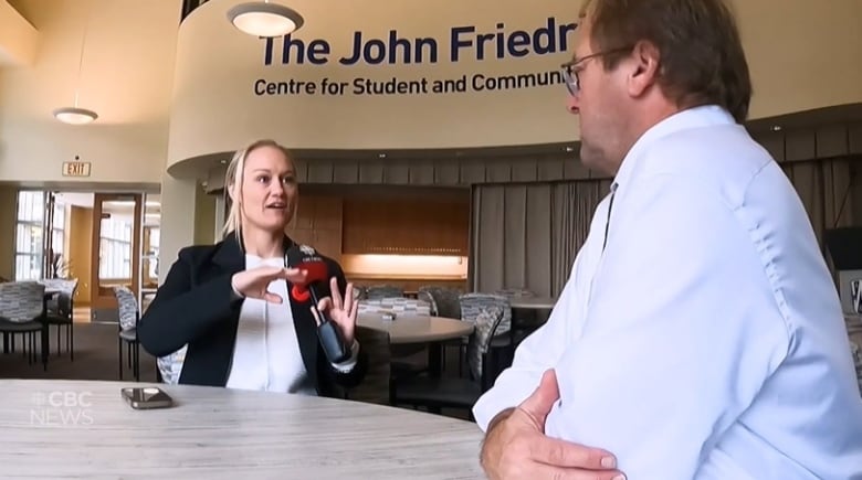 UWindsor professor David Bussiere speaks with CBC host Amy Dodge on the school's campus regarding the U.S. election.