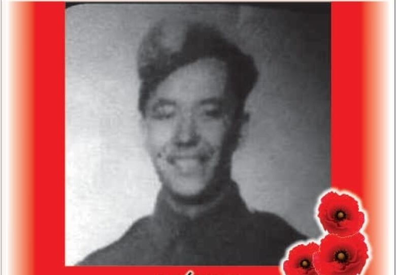 Young man in army uniform poses with a smile.