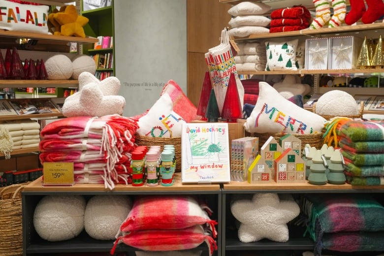 Christmas merchandise is on display in a store.