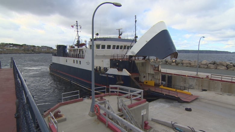 A ferry with its ramp up at Portugal Cove.