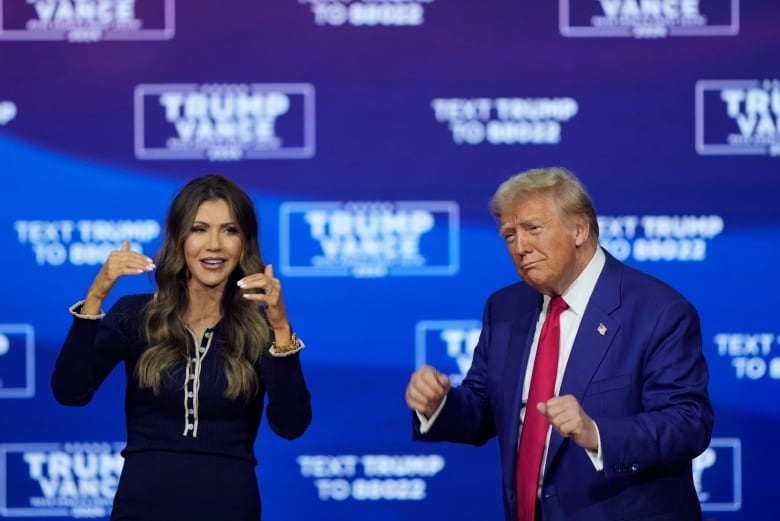 Kristi Noem and Donald Trump dance to the song 