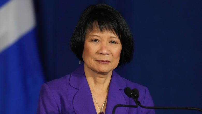 Toronto Mayor Olivia Chow attends a news conference with Ontario Premier Doug Ford, not shown, in Toronto on Monday Nov. 27, 2023.  Chow has unveiled a property tax hike lower than what officials initially proposed, while thanking the federal government for new money for refugee shelter support.