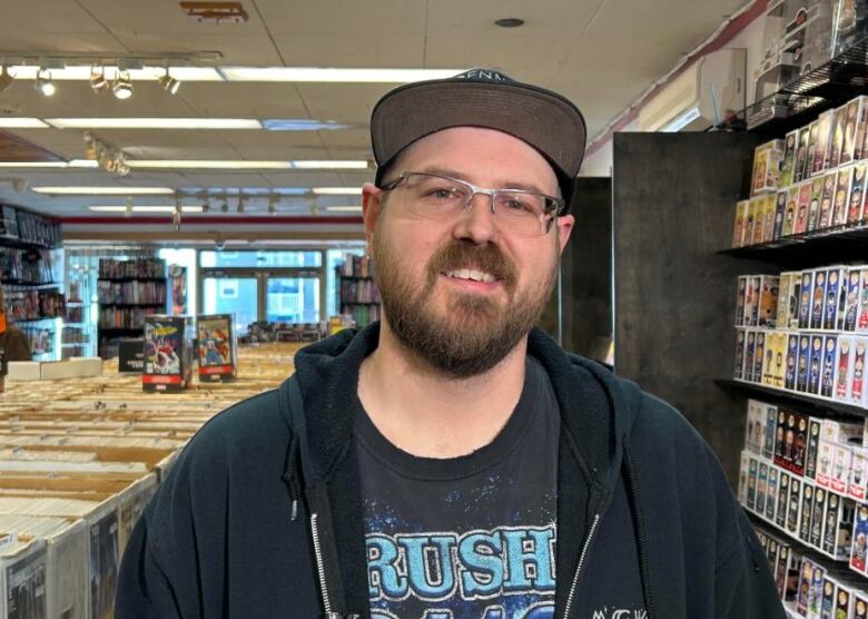 A man is shown inside a store.