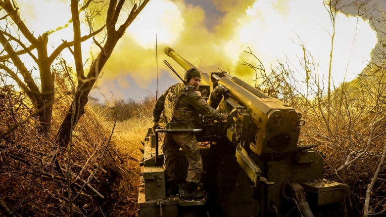 In a military handout photo, serviceman of 24th Mechanized brigade fires a 2s5 