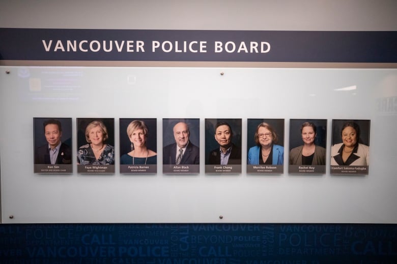 A photo of a number of portraits on a wall, underneath text that reads 'Vancouver Police Board.'